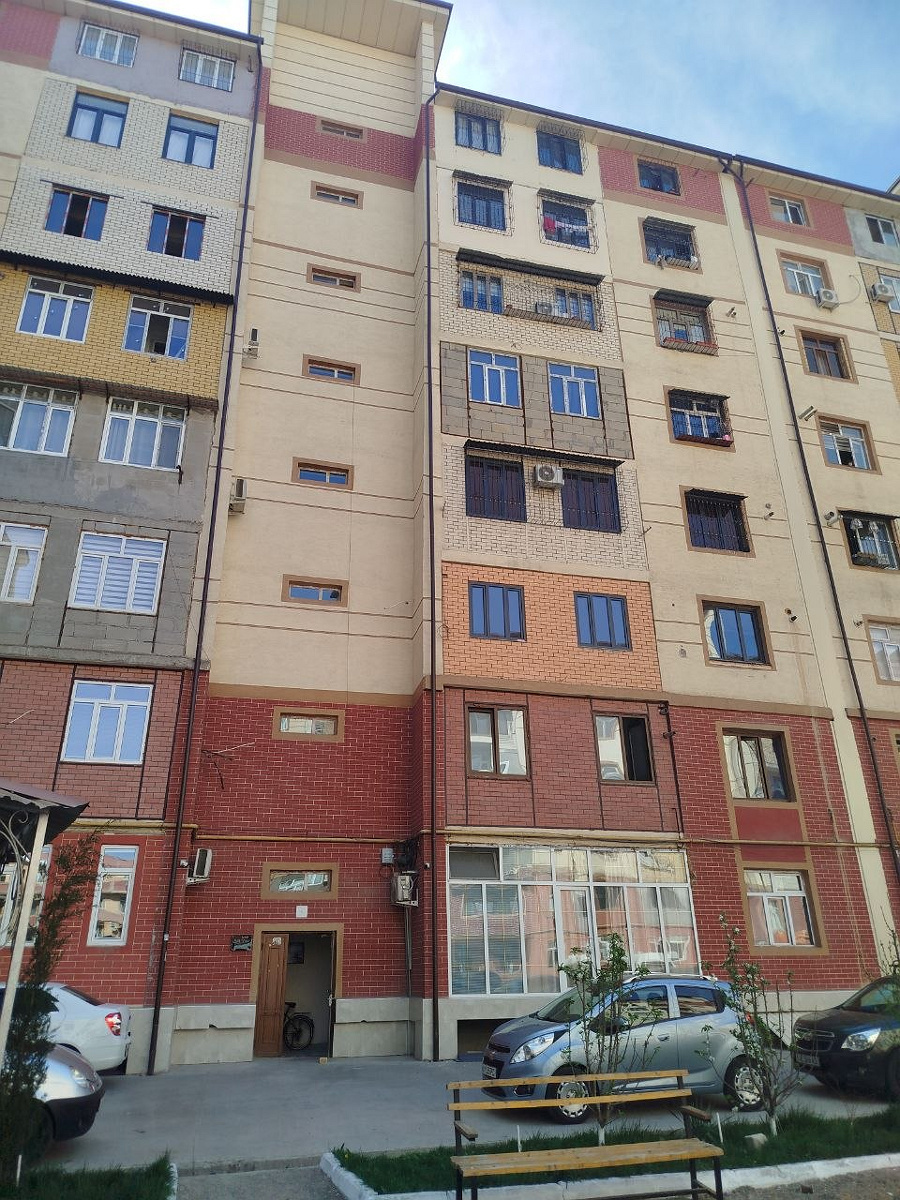 Ko'p qavatli uydagi xonadon