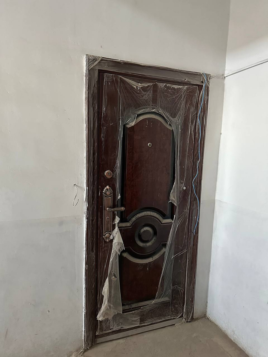 Ko'p qavatli uydagi xonadon