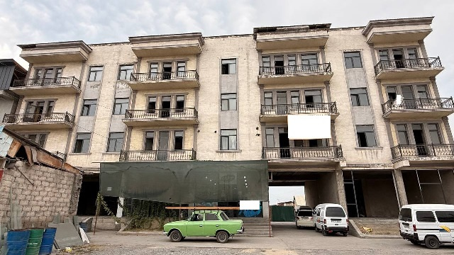 Ko'p qavatli uydagi xonadon