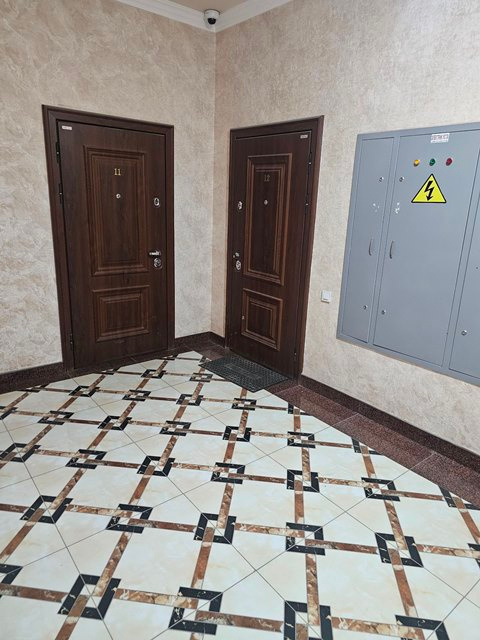 Ko'p qavatli uydagi xonadon