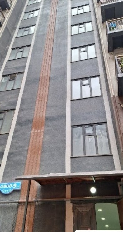 Ko'p qavatli uydagi xonadon