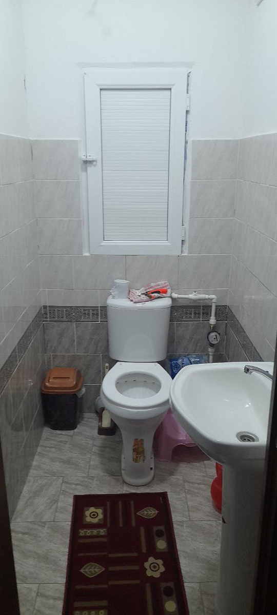 Ko'p qavatli uydagi xonadon