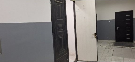 Ko'p qavatli uydagi xonadon