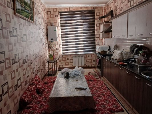 Kop qavatli uydagi xonadon